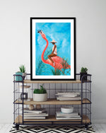 Marriage at the Plastic Garden by Alexander Grahovsky - Girl Riding Flamingo - Popular Modern Art by The Good Poster Company