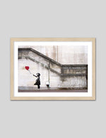 Girl with the Red Balloon Art Print by Banksy | Banksy Art | The Good Poster Co.